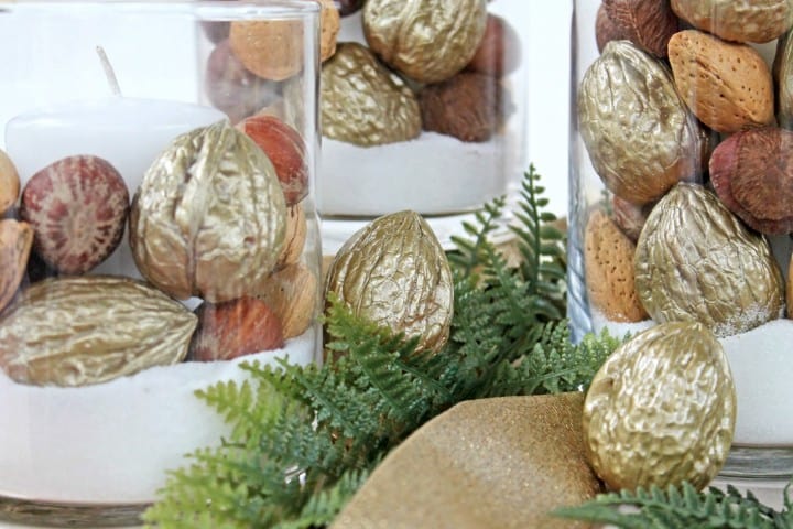 This is such an easy idea for holiday decorations and would come together so quickly! Definitely doing this with some Dollar Store candleholders and gold- painted nuts! 