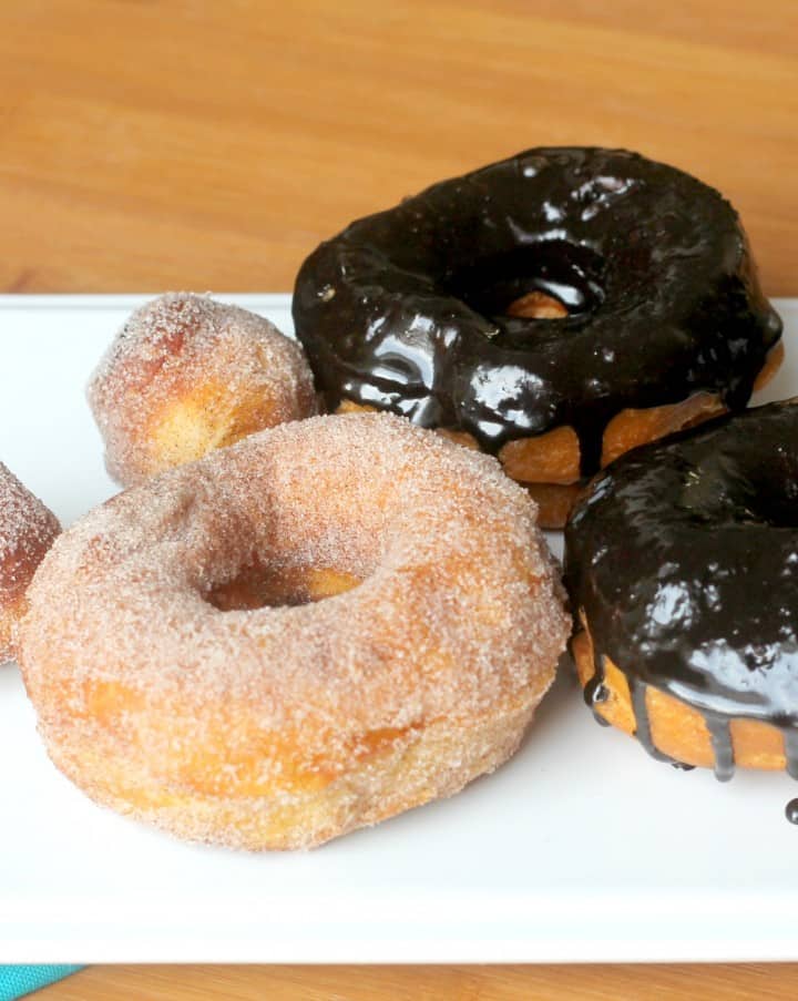 Biscuit donuts with chocolate glaze and cinnamon sugar! The easiest donuts and so good when they're warm!