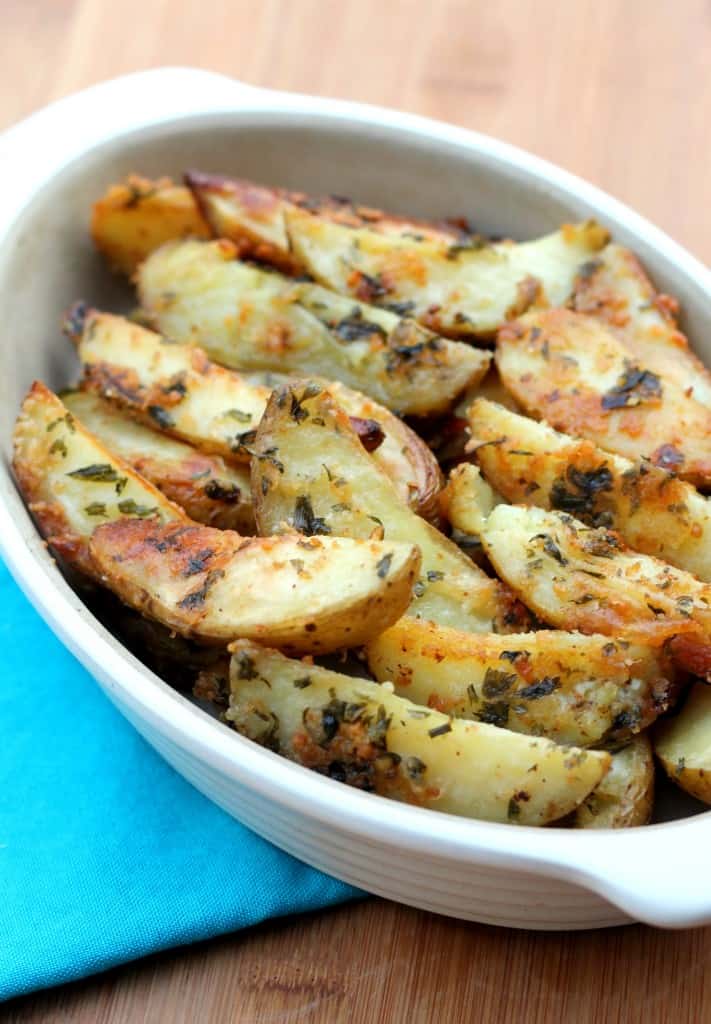 Parmesan Baked Potatoe Wedges. These are so EASY to make and the whole family will love them! My kids gobble them up!