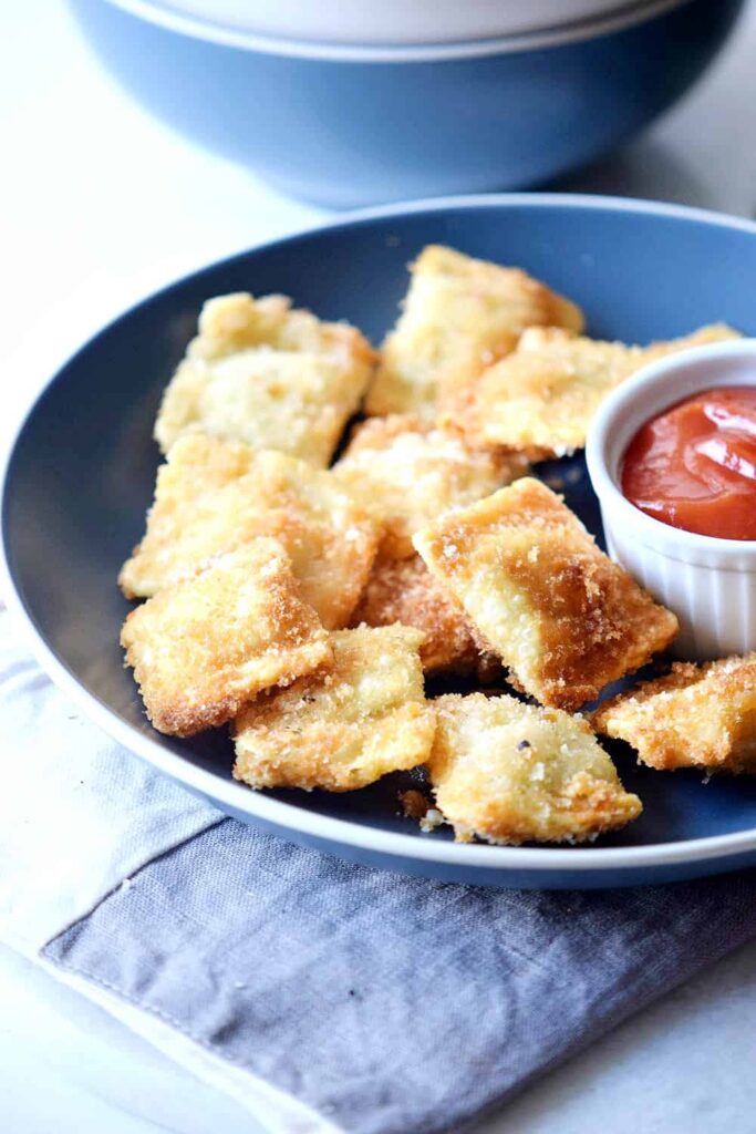 Oven Toasted Ravioli Recipe that can be used as an appetizer or a main course! Either way, it's delicious!