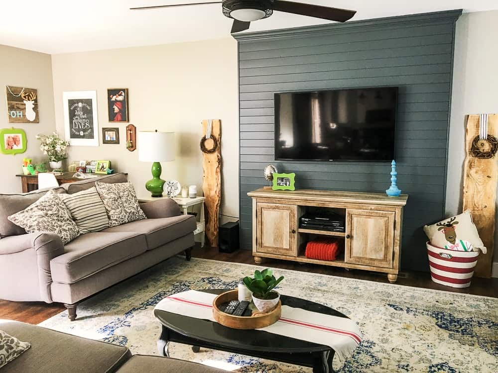 living room with gray pallet accent wall